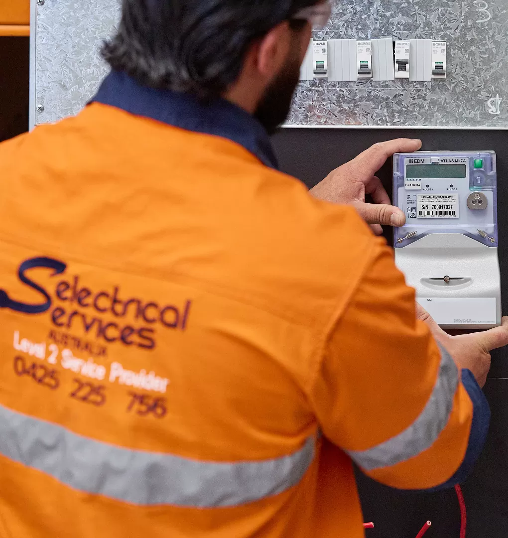 Electrician Installing A New Meter