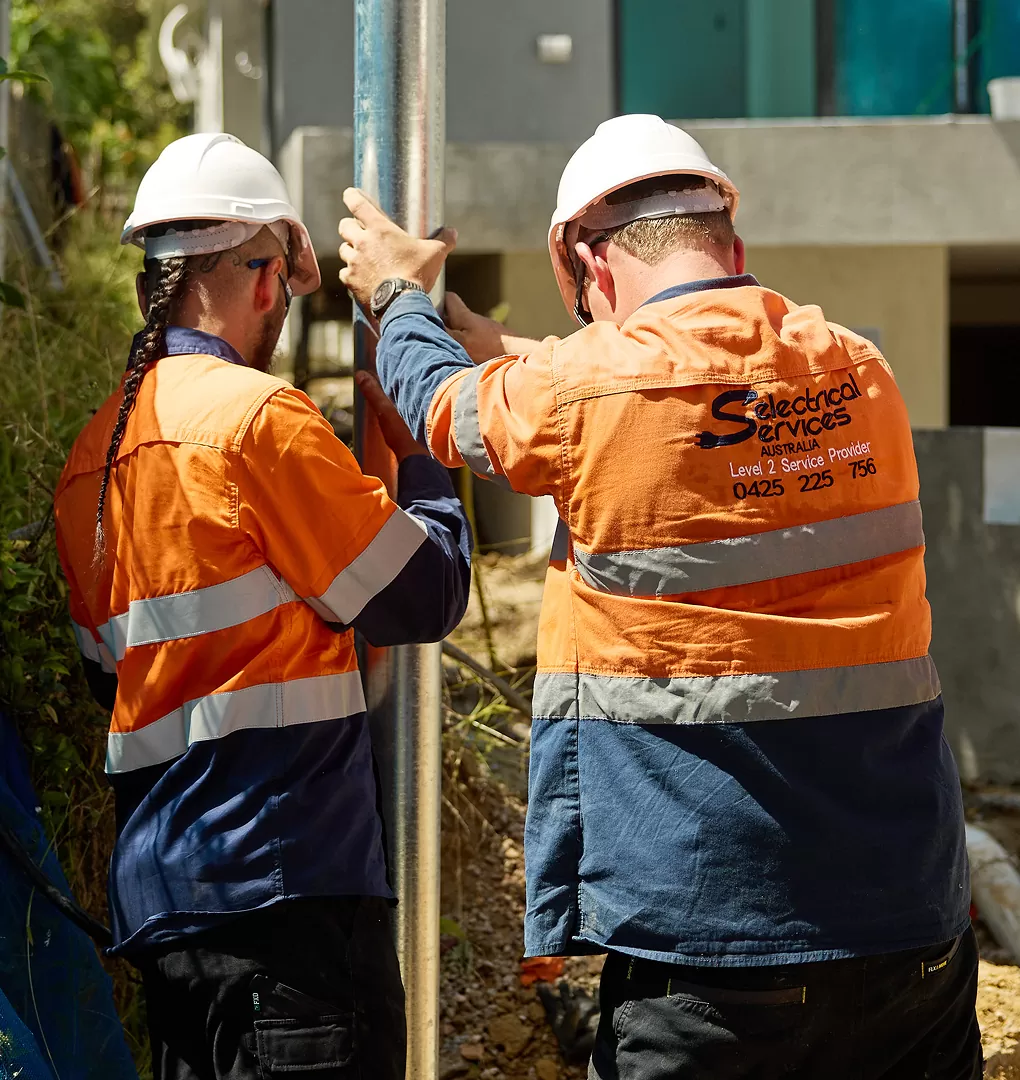 Electrician Team Installs New Electric Poles